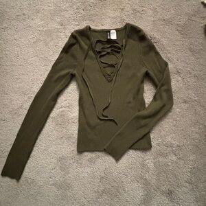 Super cute never been worn ribbed sweater with lace up detail